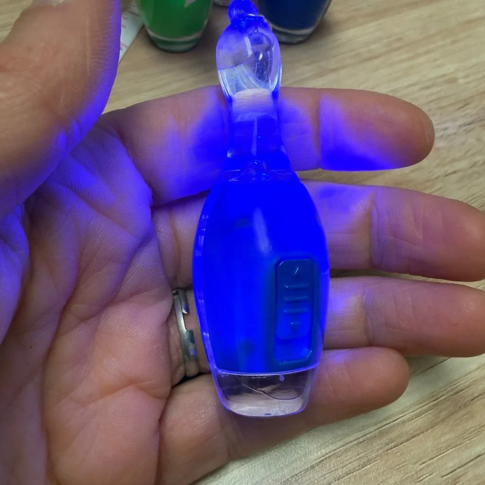 Set of 4 Bowling Pin Light Up LED Keychains Blue Green Orange Novelty